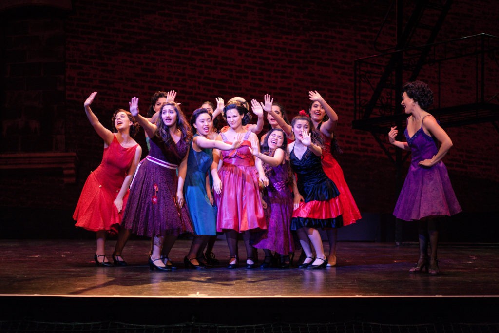 West Side Story - dancers in costume performing and singing