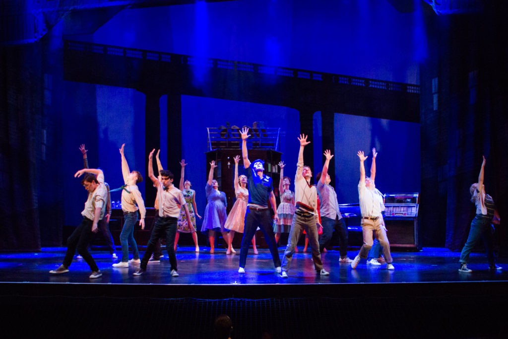 West Side Story - group shot with hands up