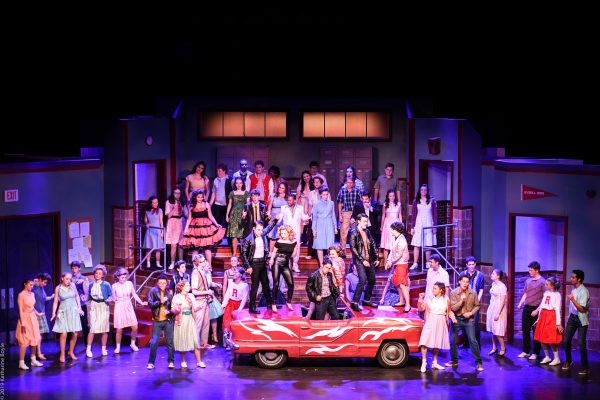 grease group shot with prop car