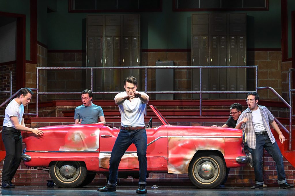 danny zuko and friends on stage