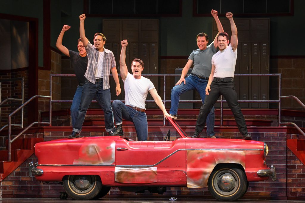 danny zuko and friends on stage