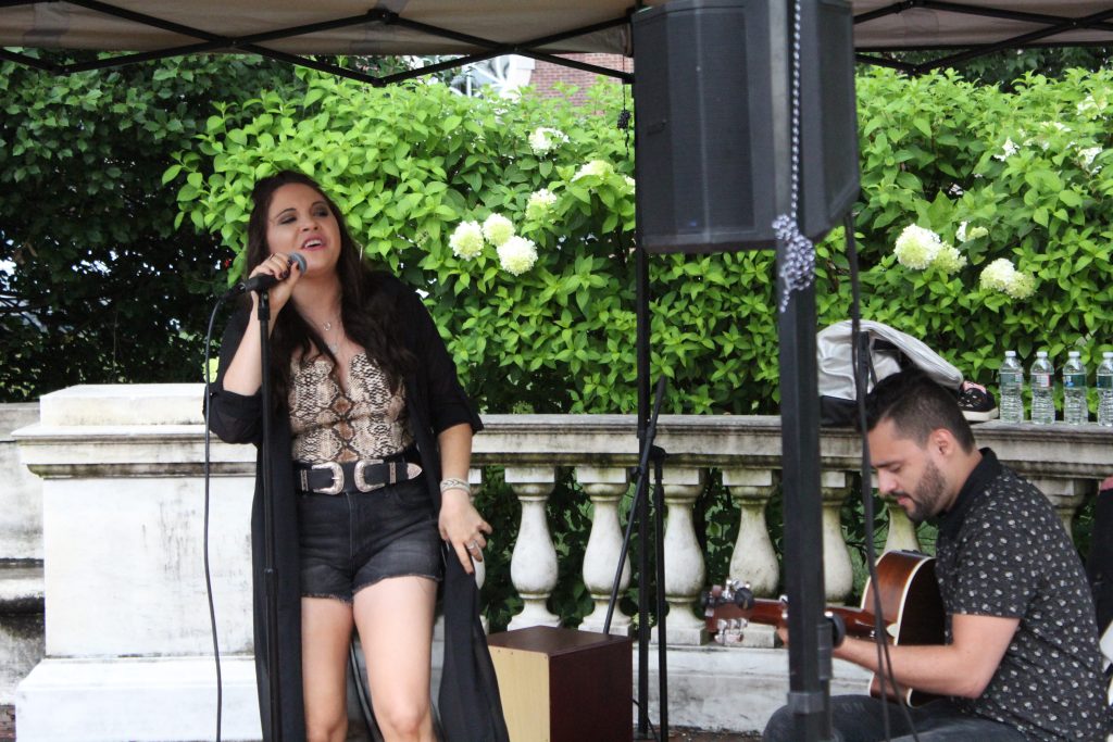 Lauren Davidson singing outdoors