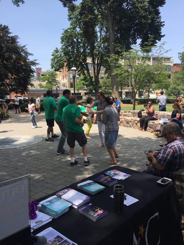 Music Beyond Borders - Grupo Sabor outdoor concert, people dancing