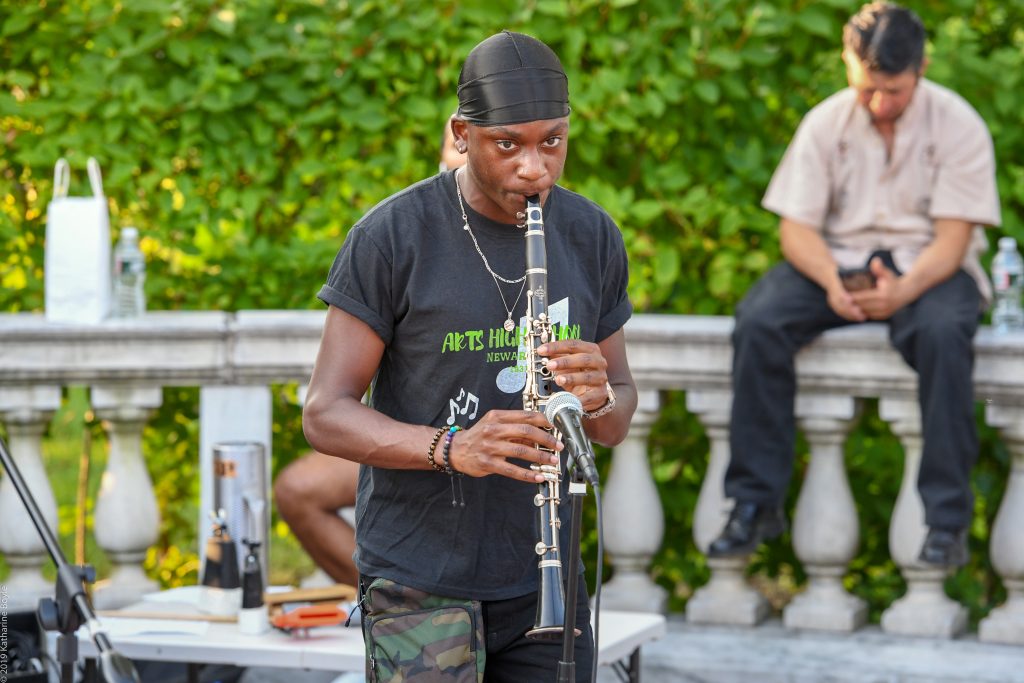 Salsa Under The Stars instrumentalist playing outdoors