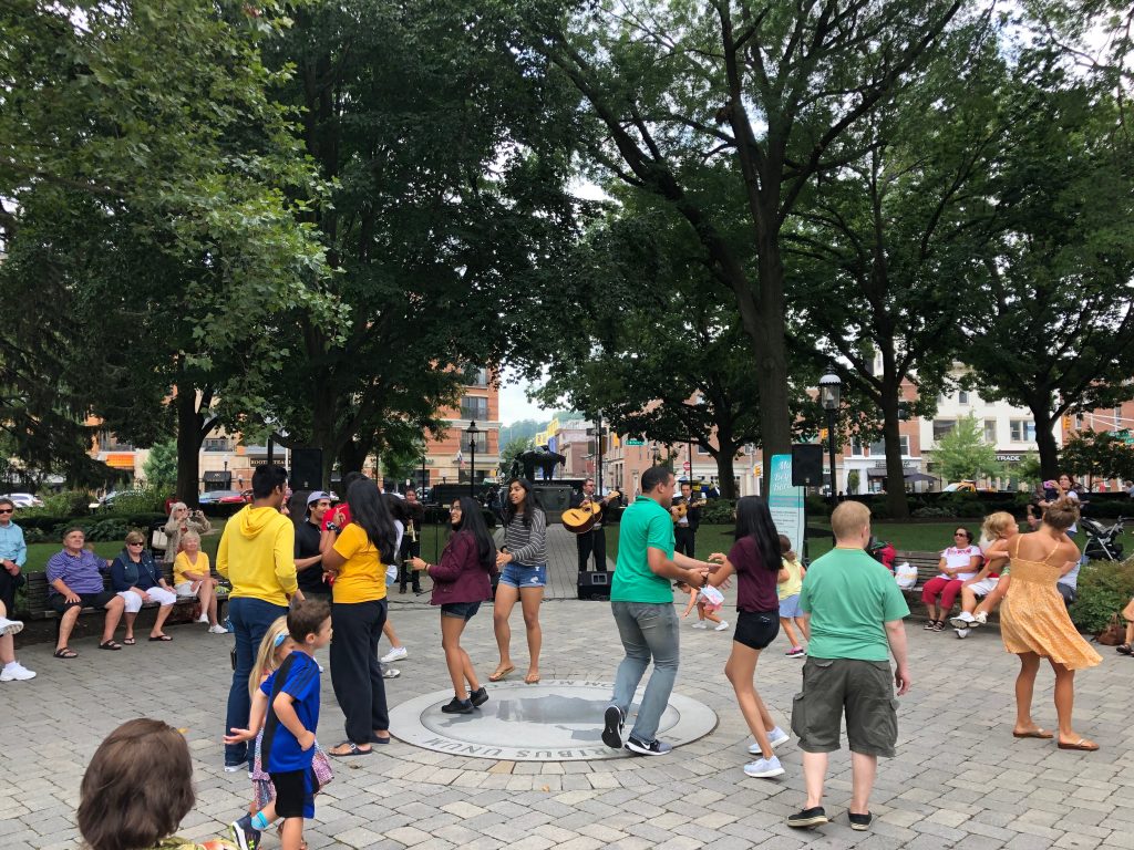 Mariachi Artistico outdoor concert, large group dancing