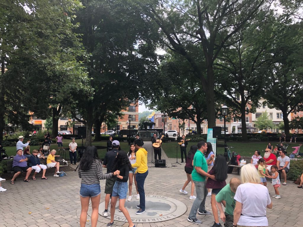 Mariachi Artistico outdoor concert, large group dancing