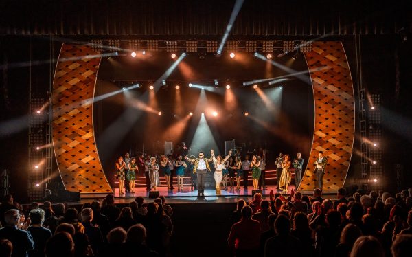 on your feet cast on stage wide shot