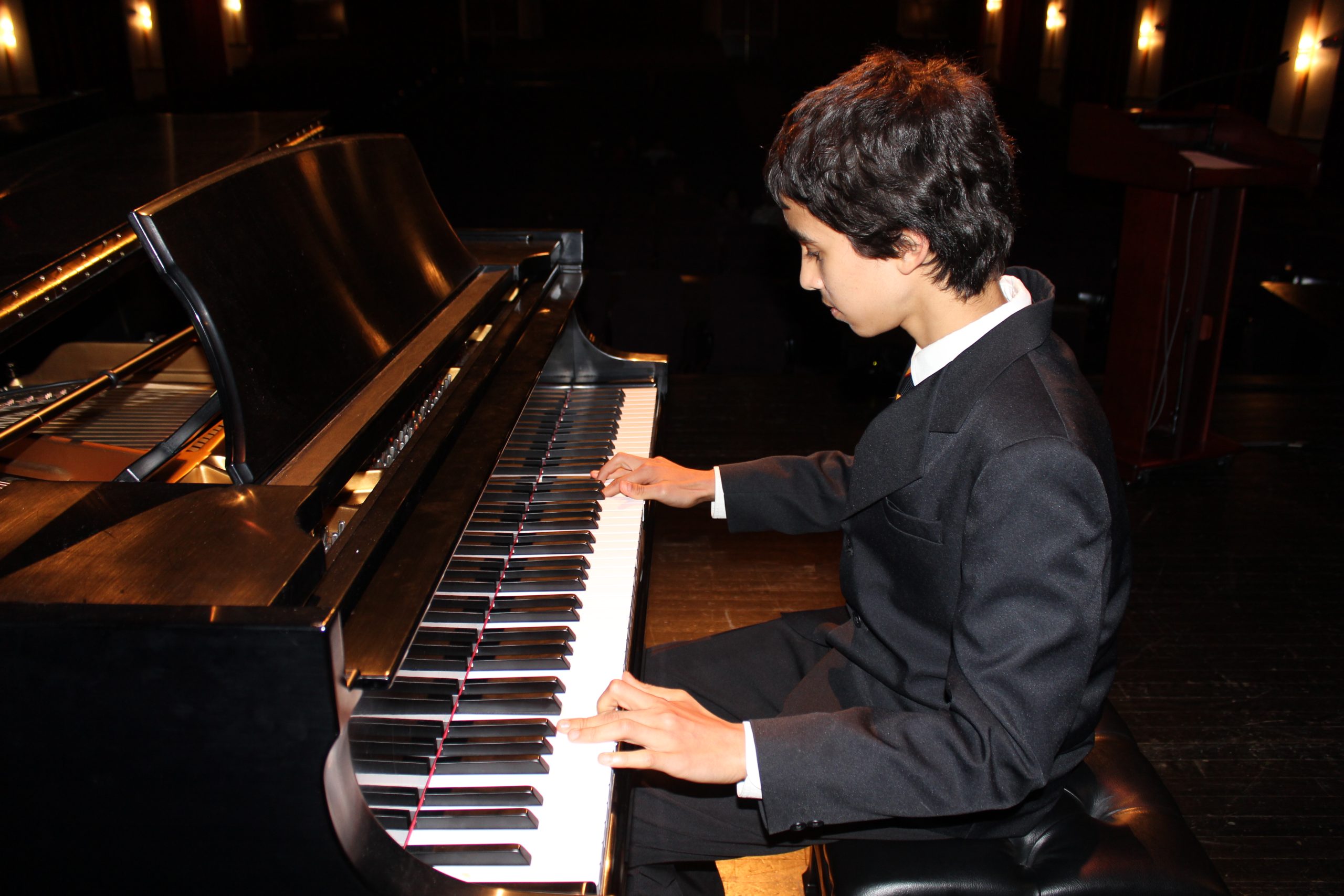 boy playing piano