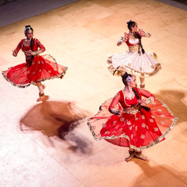 girls dancing in traditional indian garb