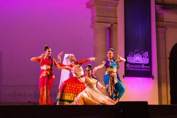 girls dancing in traditional indian garb