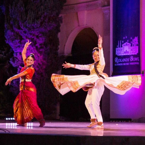 girls dancing in traditional indian garb