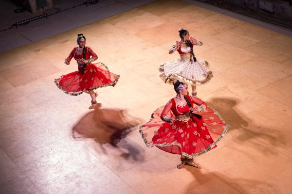 girls dancing in traditional indian garb