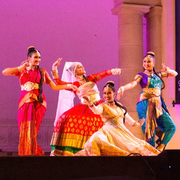 girls dancing in traditional indian garb