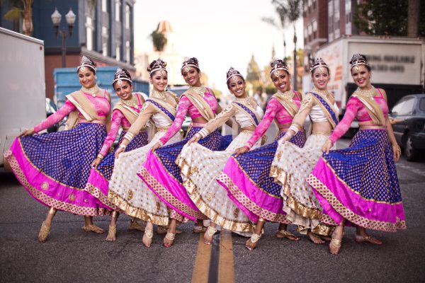 girls dancing in traditional indian garb