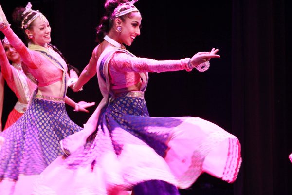 girls dancing in traditional indian garb