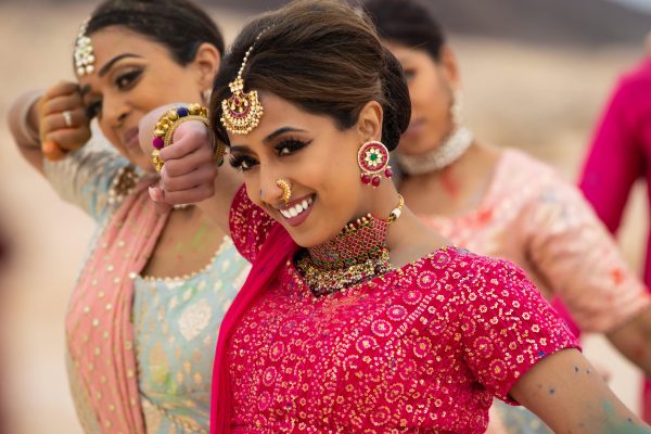 girl smiling in traditional indian garb