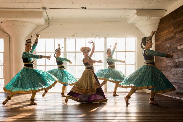 girls dancing in traditional indian garb