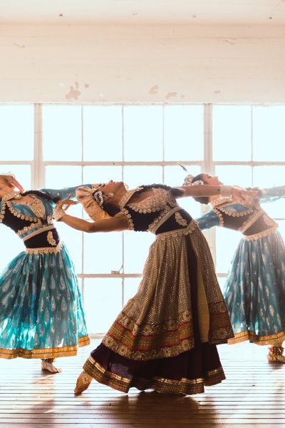 girls dancing in traditional indian garb