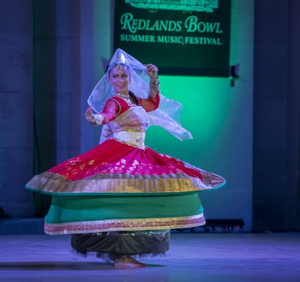 girl dancing in traditional indian garb