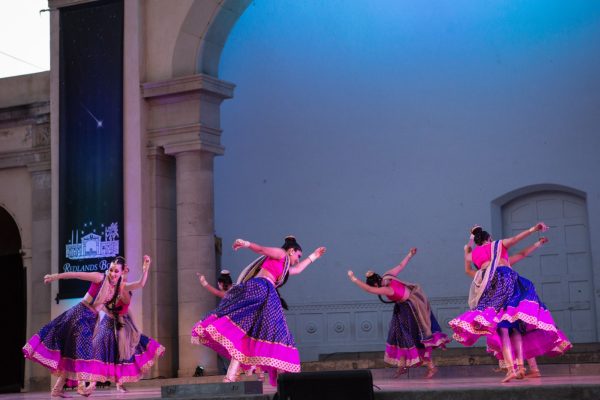 girls dancing in traditional indian garb