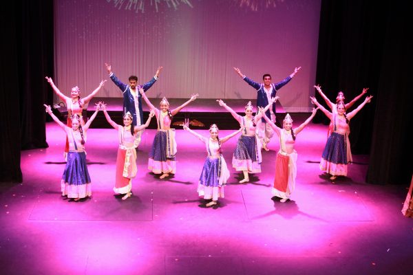 girls dancing in traditional indian garb