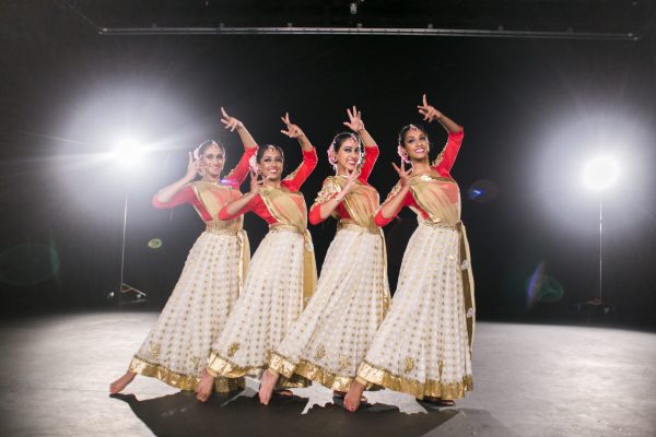 girls dancing in traditional indian garb