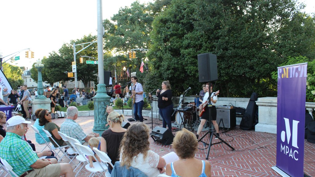 mama d and the vexations performing for crowd