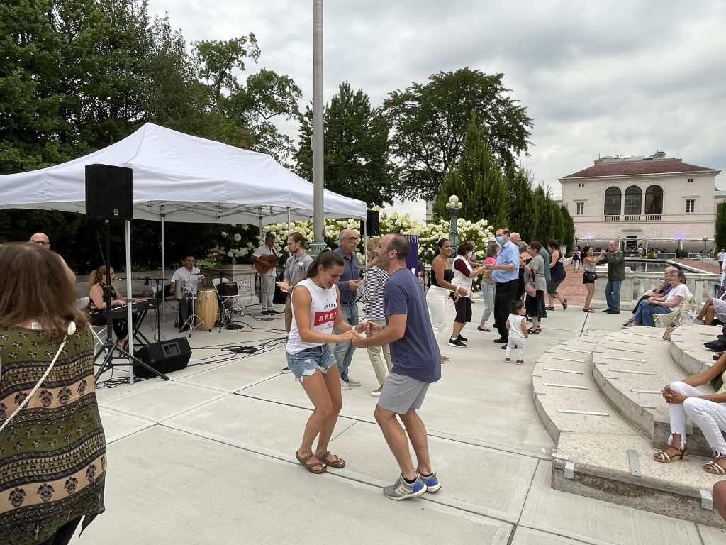 couples dancing at salsa under the stars