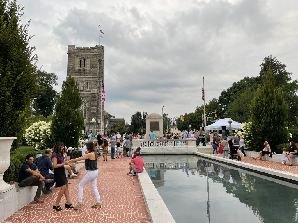 crowd and dancers on vail mansion plaza