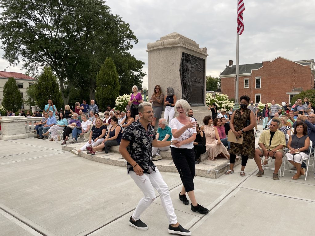 woman dancing with instructor