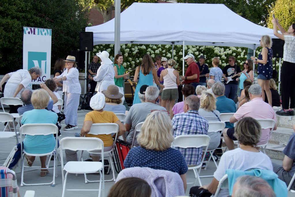 crowd watching john mcdermott band