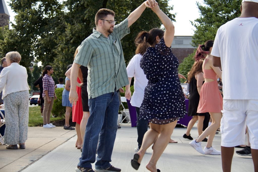 couple dancing at salsa under the stars