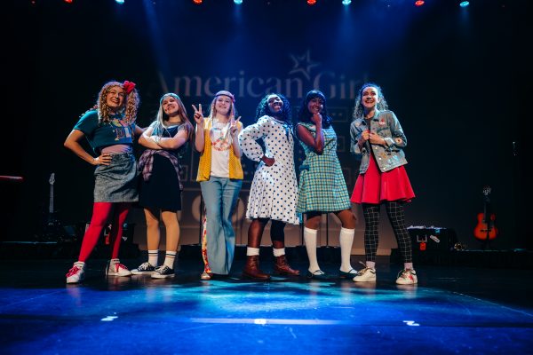 american girl live in concert production photo, girls posing on stage